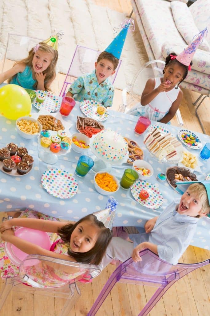 children at a table at a birthday party