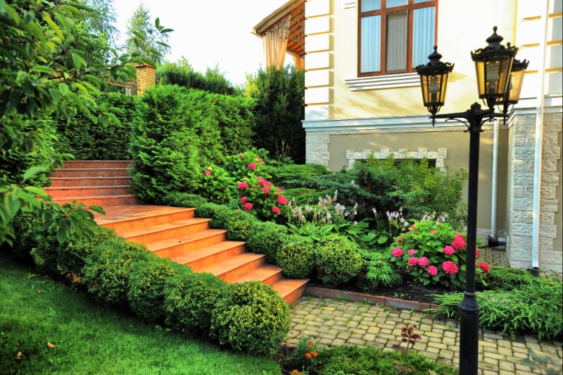 home with landscape design around steps