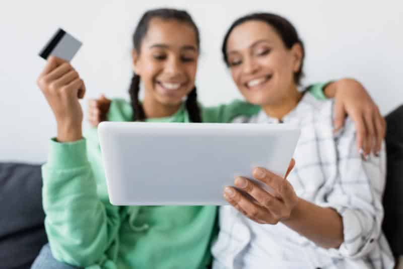 mom and teen shopping online