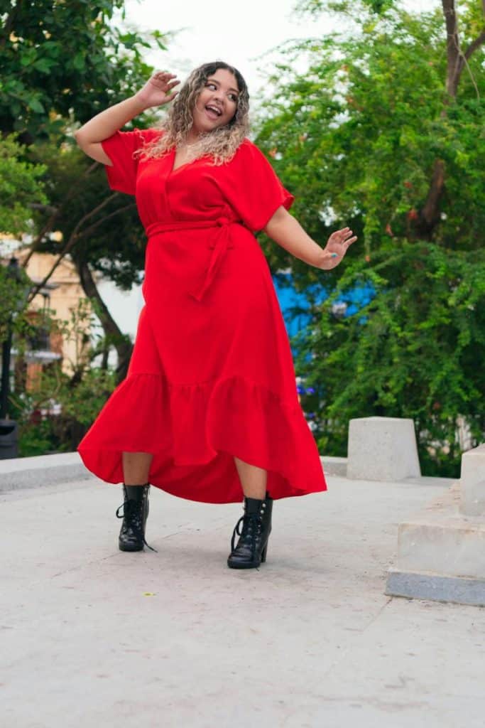 woman dancing in red dress