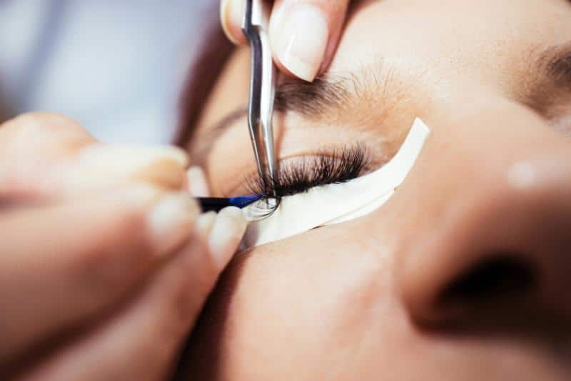 applying eyelash extensions