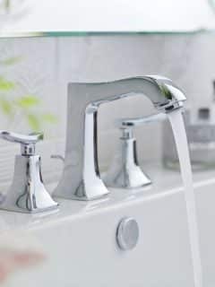 nice bathroom faucet with water streaming