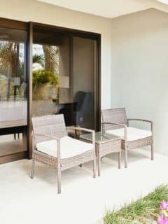 patio with chairs and small table in between