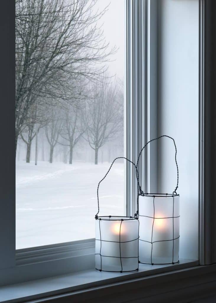 wintery window with lanterns