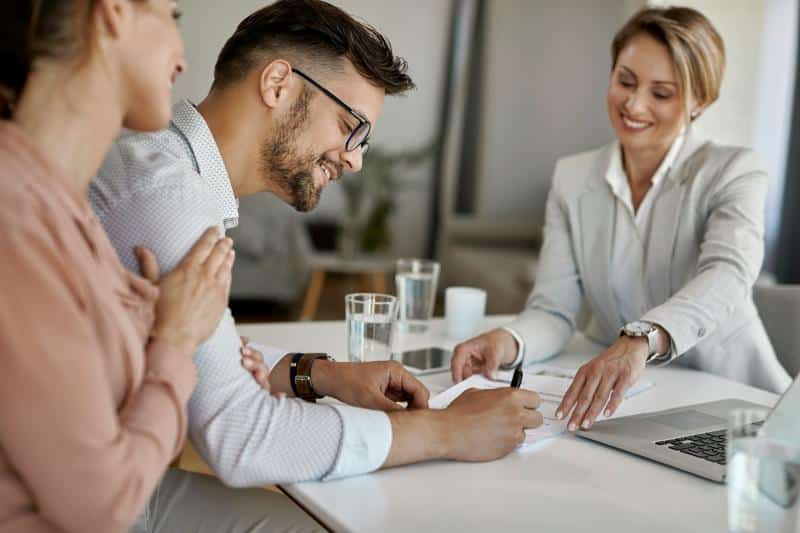 couple signing a contract