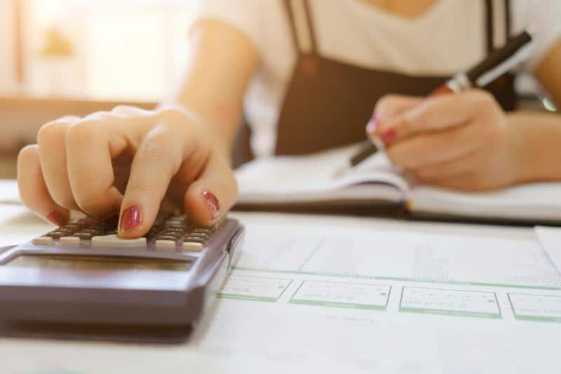woman using a calculator