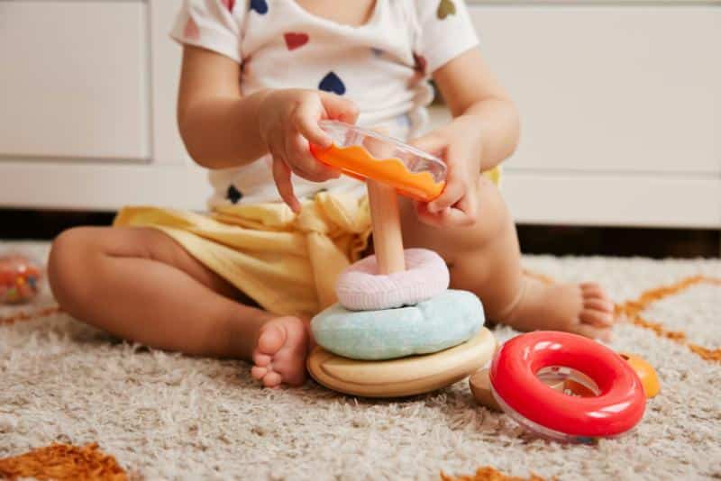 toddler stacking ring toys on peg