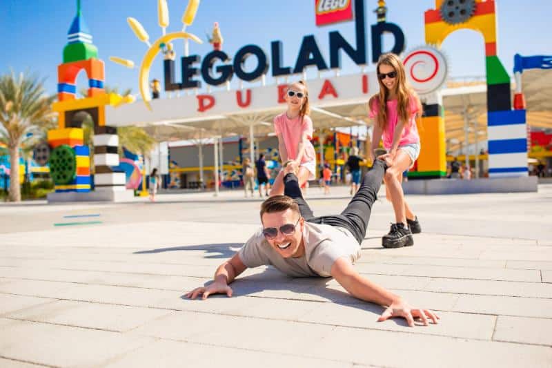 Dad and daughters at Legoland in Dubai