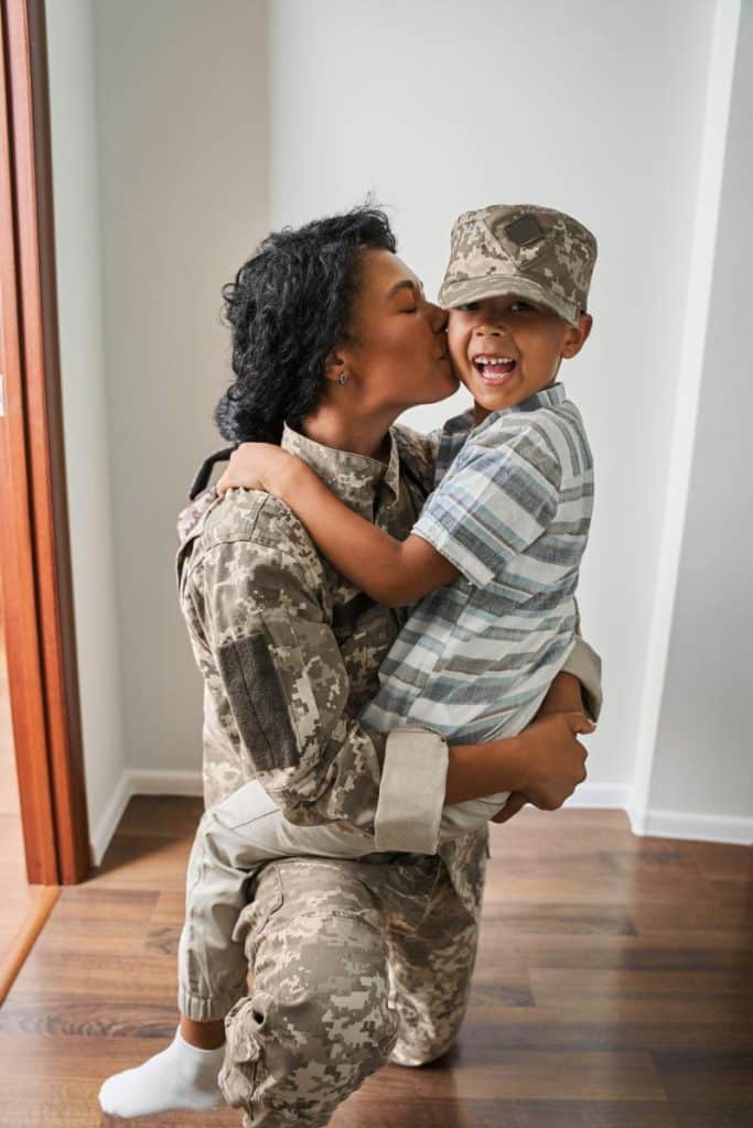 military mom hugging her son