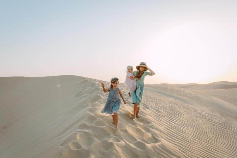 Mom and daughters in Dubai desert