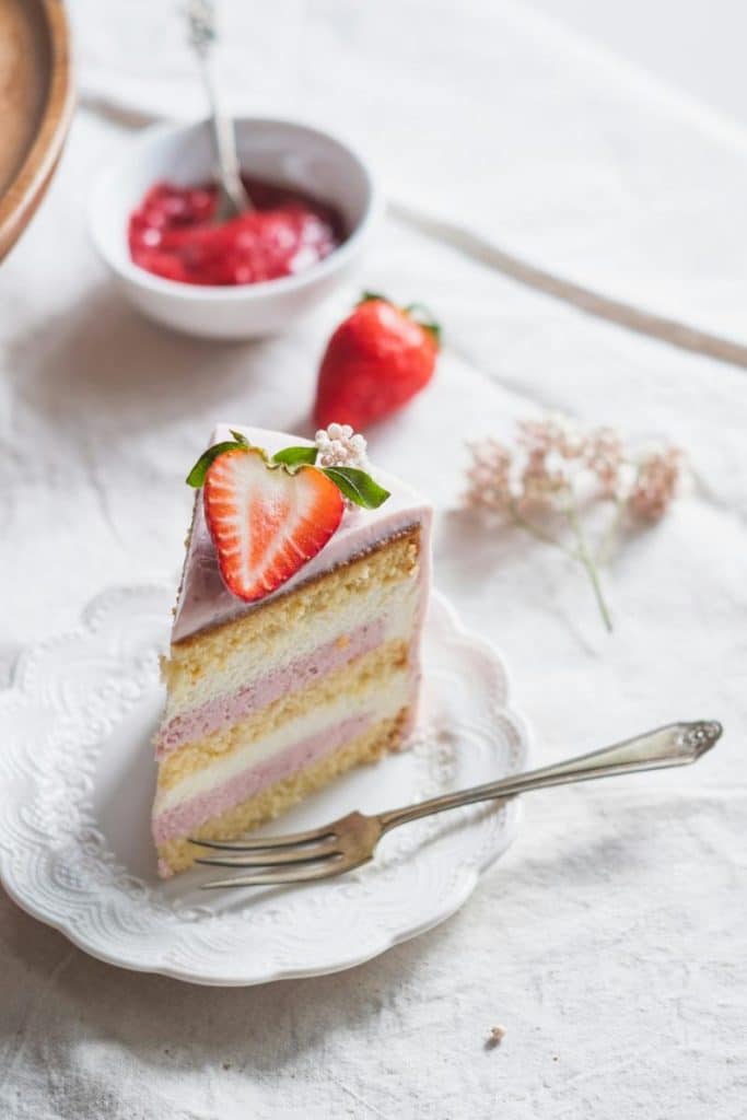 strawberry cake on white plate