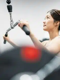 woman weight training in a gym