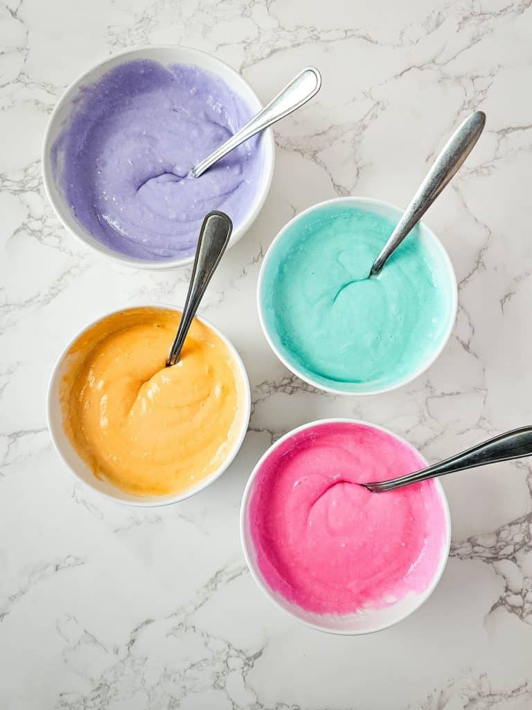 cake batter with food coloring mixed in