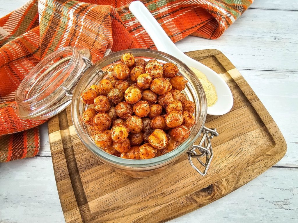 overhead picture of roasted bbq chickpeas in glass jar