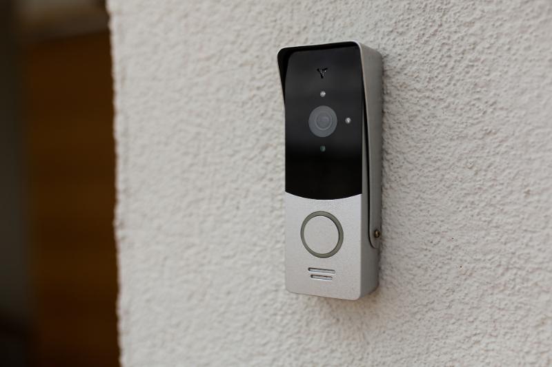 doorbell camera attached to wall