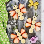 fruit butterfly snacks on marble cutting board