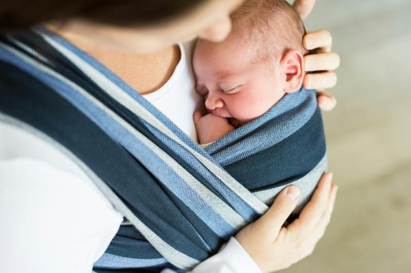 mom baby-wearing with a wrap