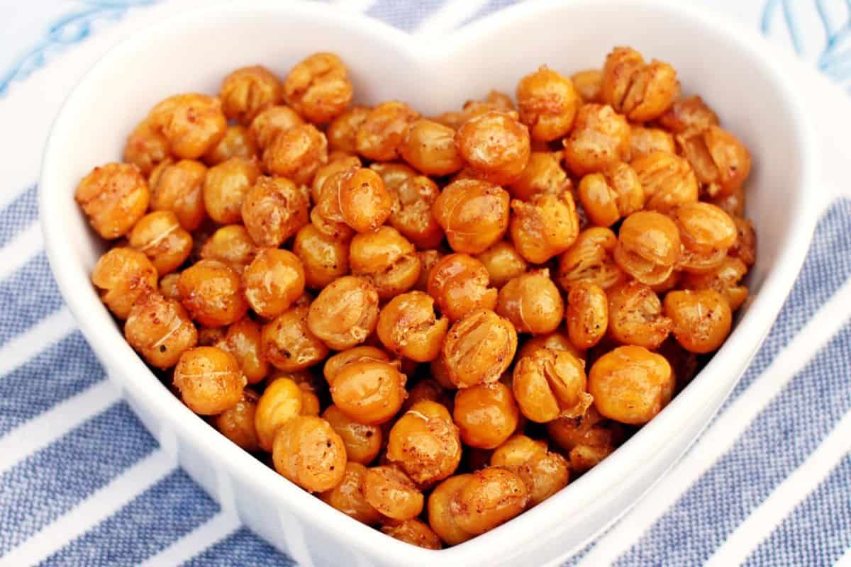 smoky maple chickpeas in heart-shaped white bowl