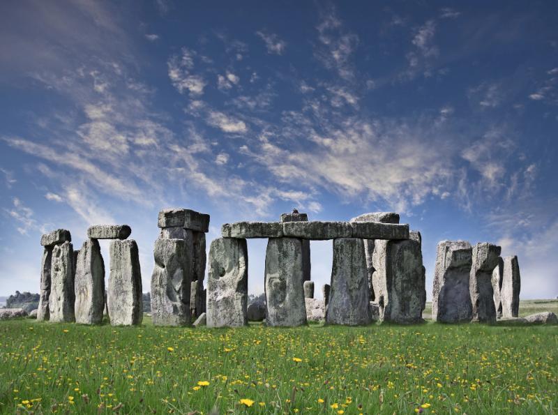 stonehenge with blue sky and thin, wispy clouds