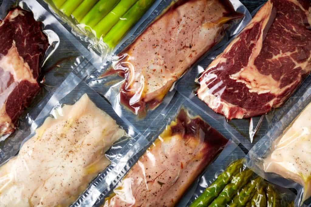 meats and veggies in vacuum sealed bags