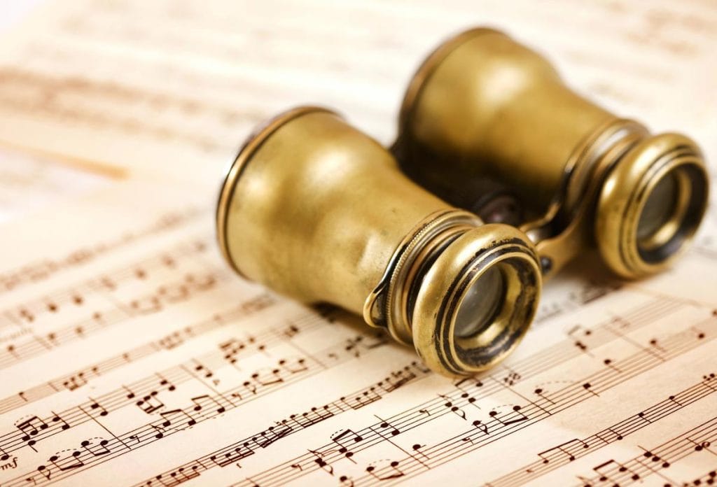 binoculars on sheet music