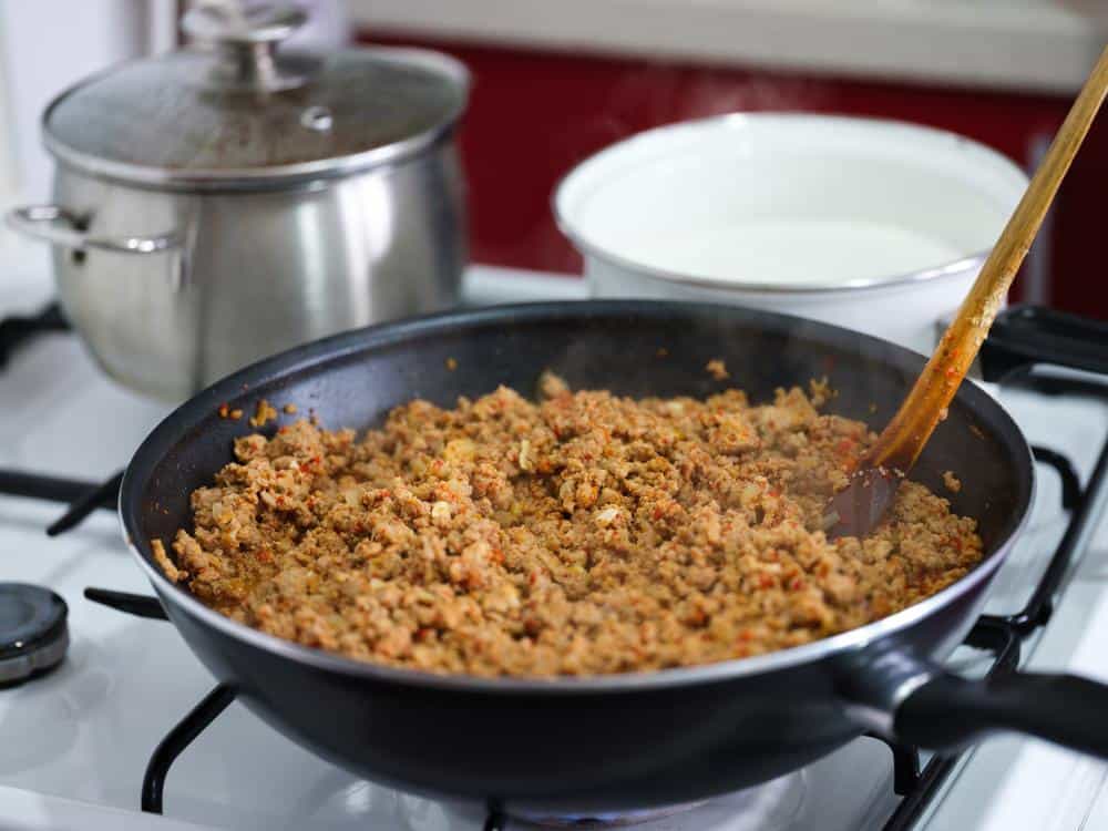 pan of seasoned ground beef cooking