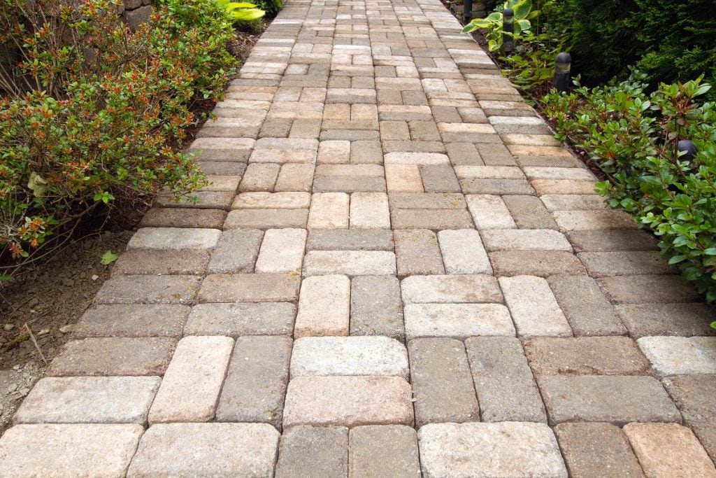 walkway made with brick pavers in a mosaic pattern