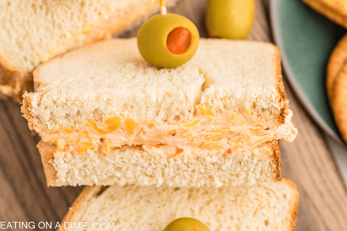 pimento cheese sandwich with olive and toothpick