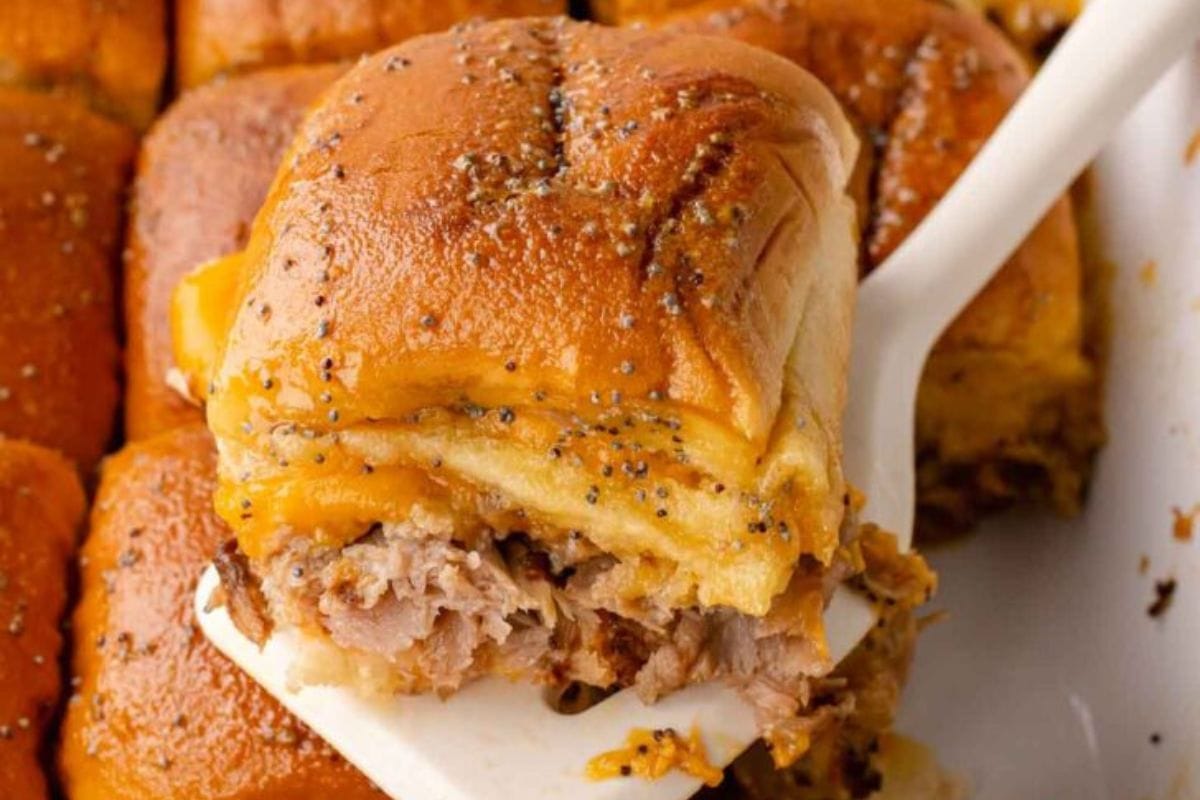 roast beef and cheese slider on white spatula