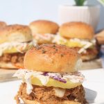 teriyaki chicken sandwiches topped with creamy coleslaw and sweet pineapple