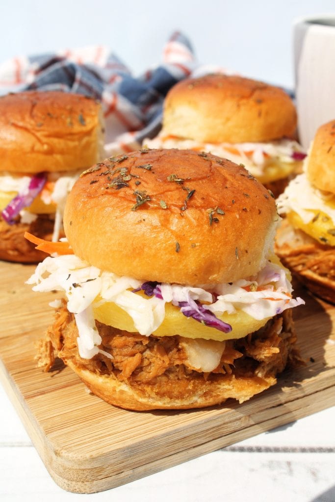 closer view of chicken teriyaki sliders with pineapple and tangy coleslaw