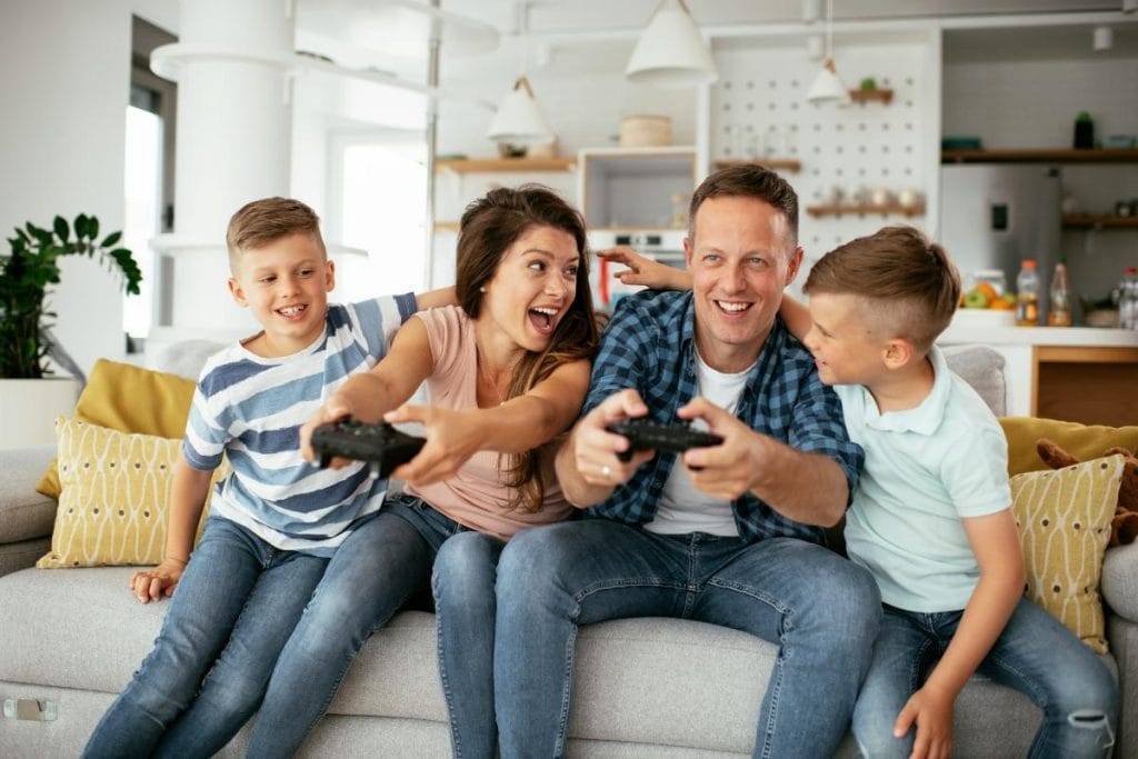 family playing video games together