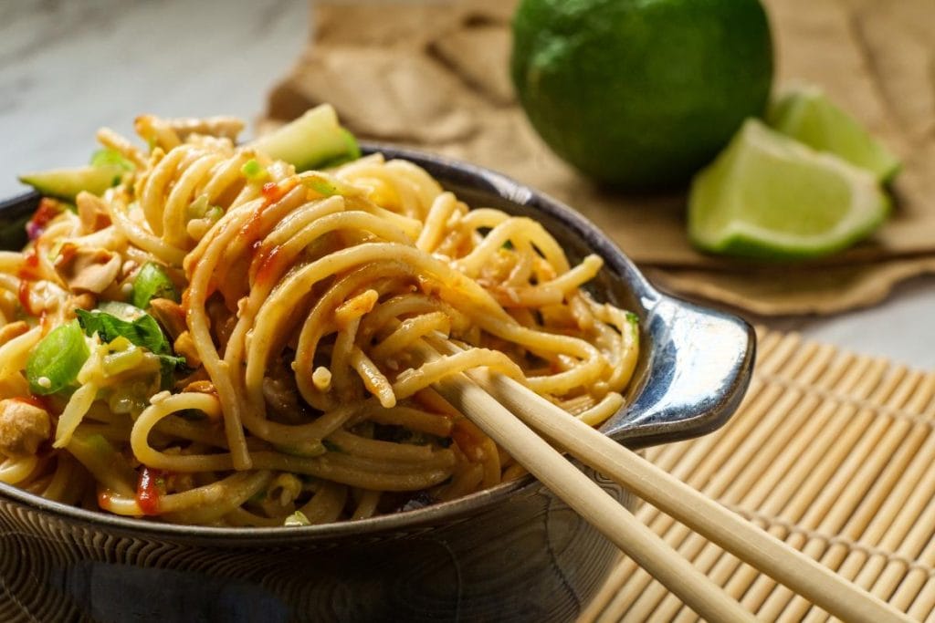 lo mein in bowl with chopsticks
