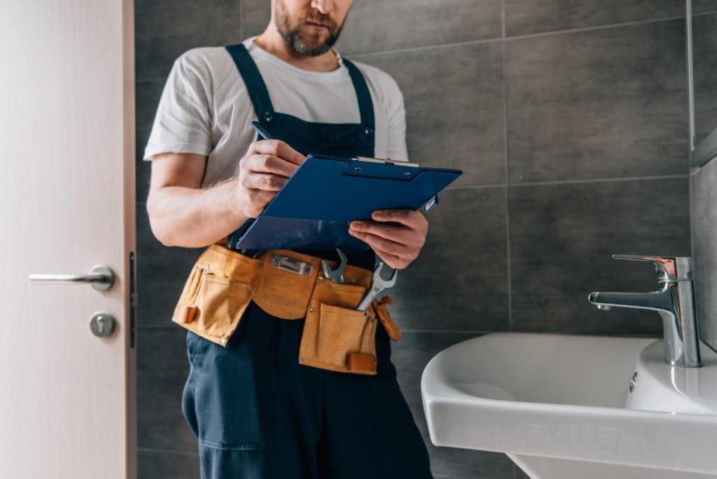 plumber with a clipboard