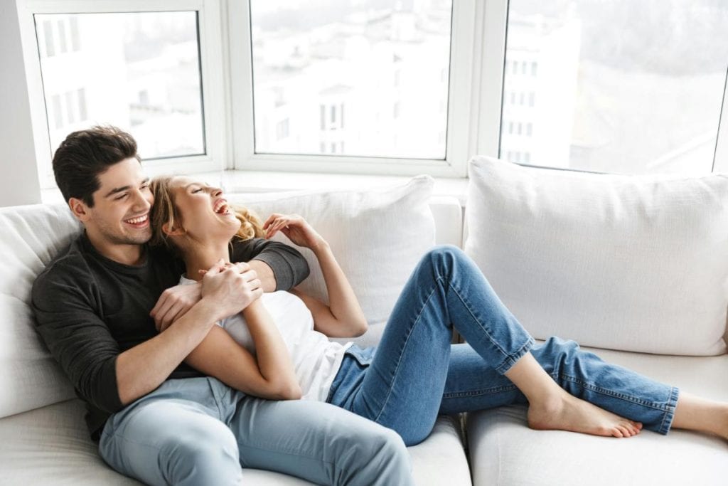 happy couple on the couch