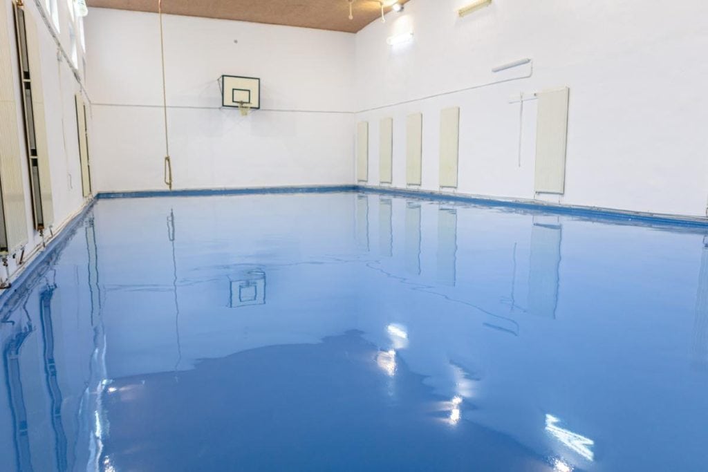 blue epoxy floor in gym