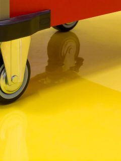 cart on yellow epoxy floor