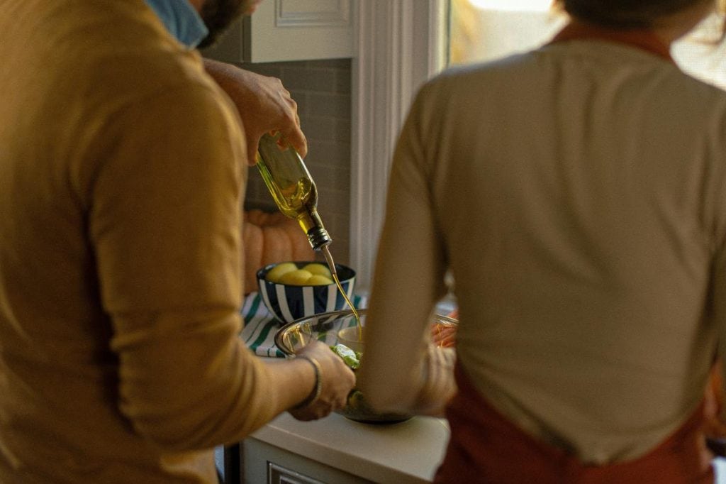 couple making a salad together