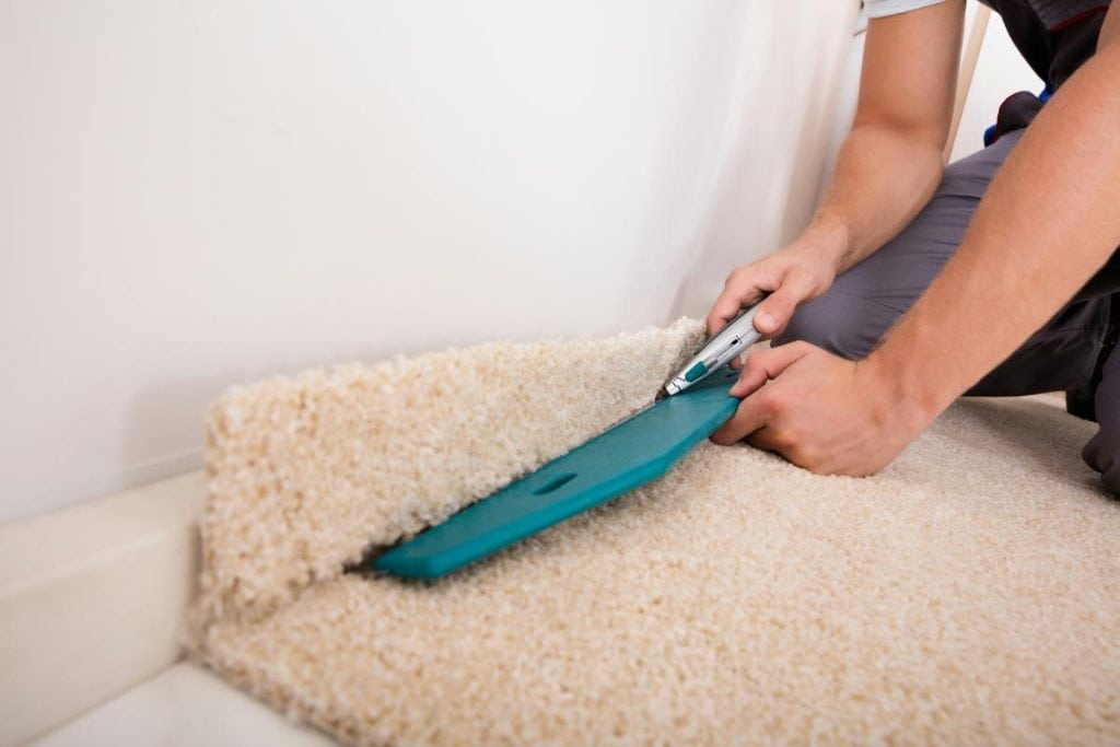 installing carpeting