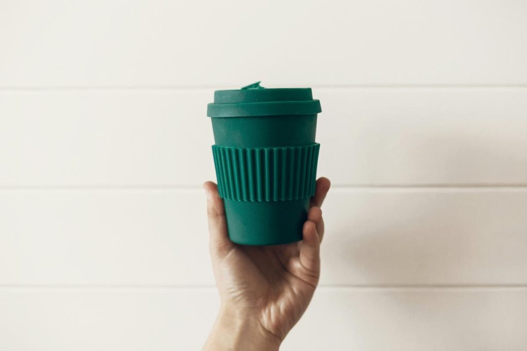 green reusable coffee cup