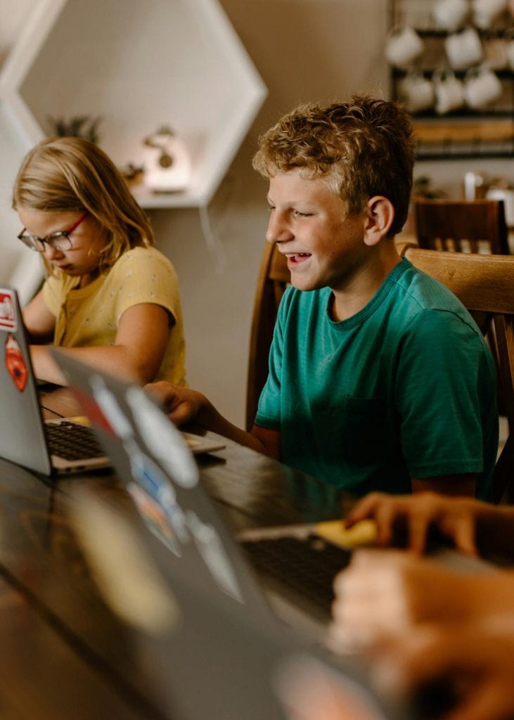 boy and girl learning online