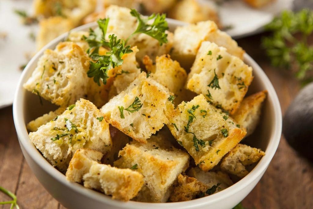 homemade croutons in white bowl