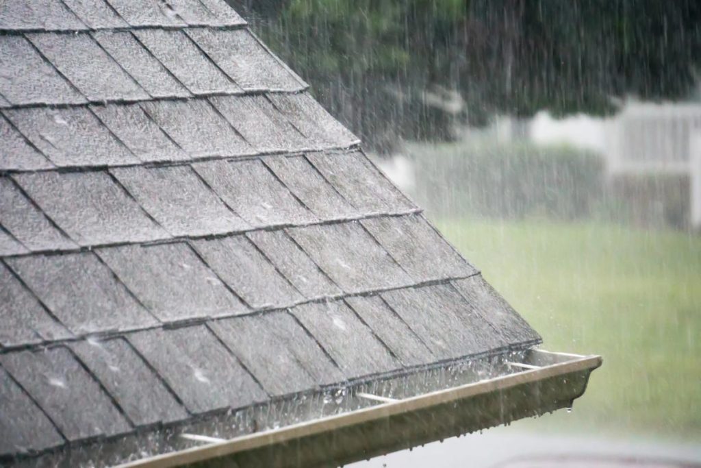 rain pouring down into gutters