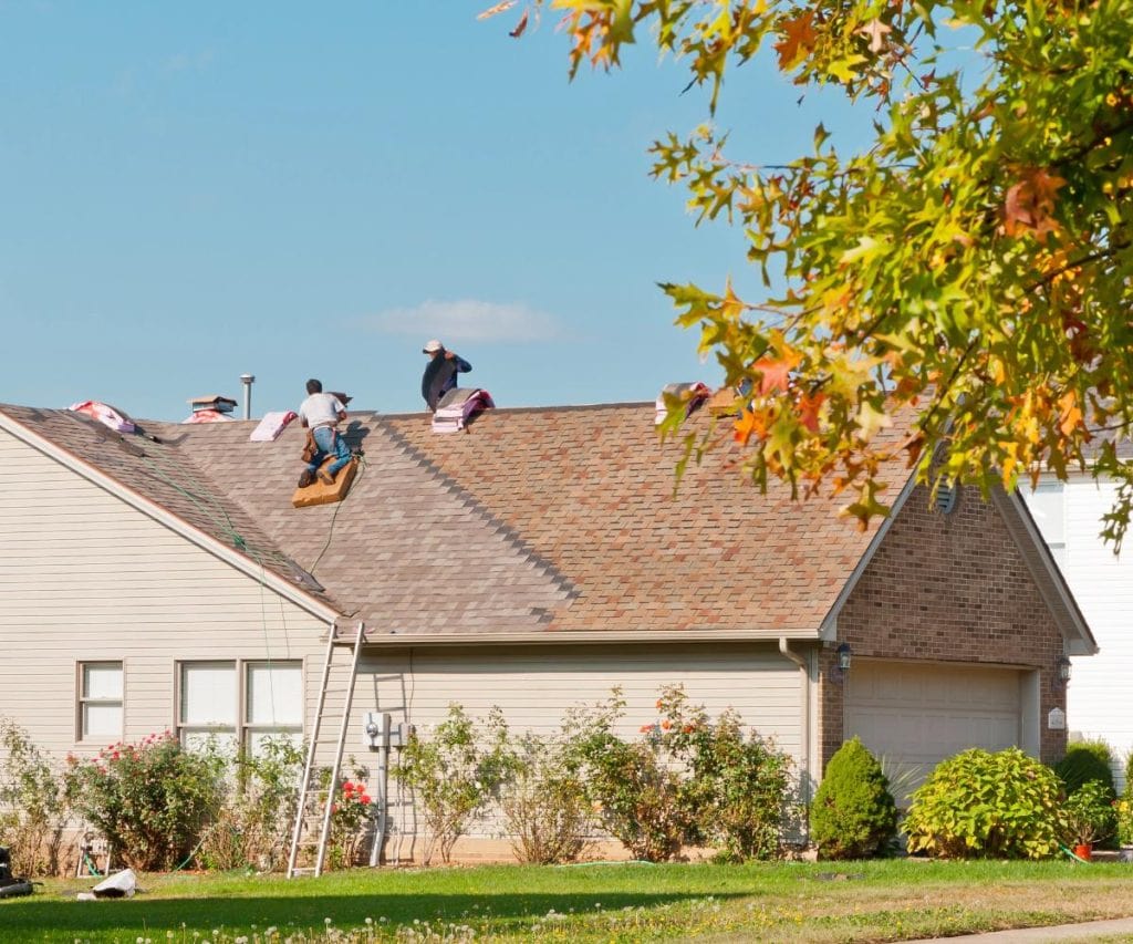 workers repairing a roof