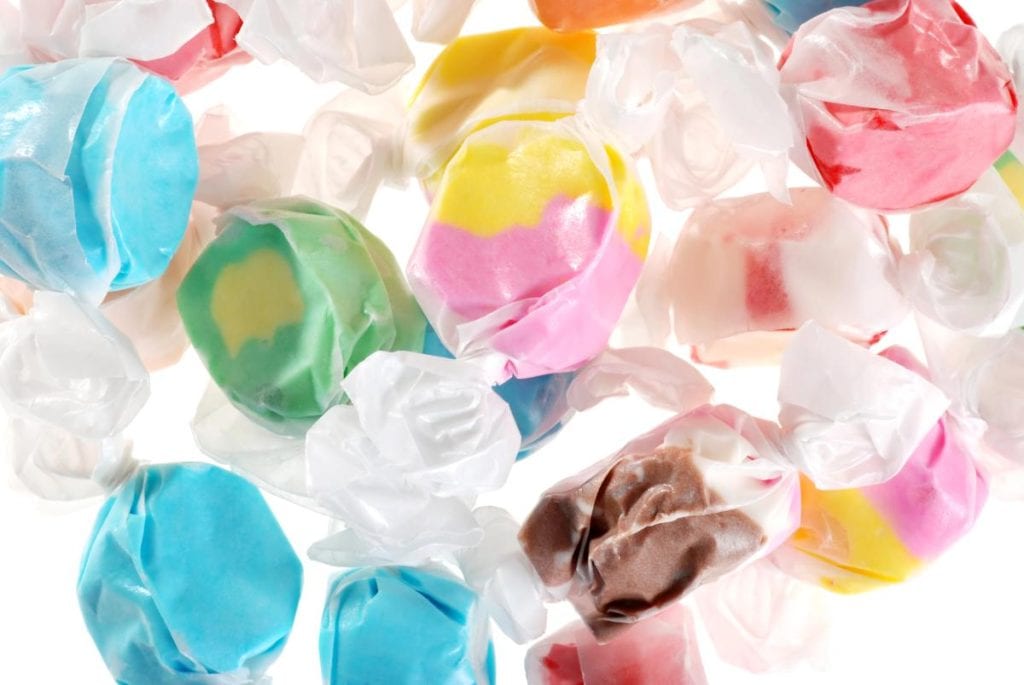 wrapped salt water taffy on white background