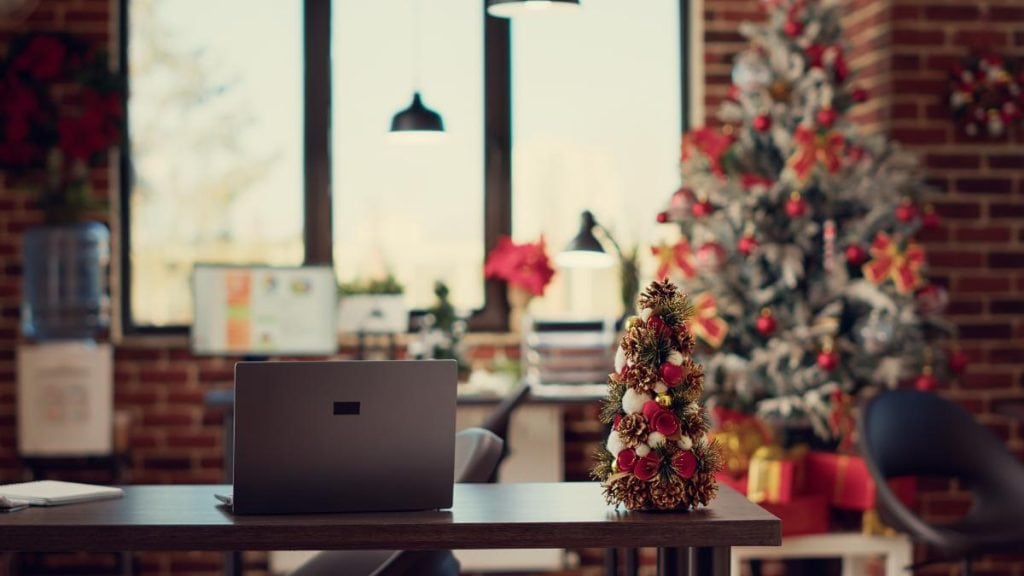 a small office decorated for christmas