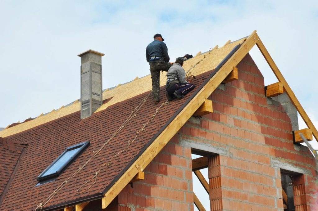 roof installation on new brick home