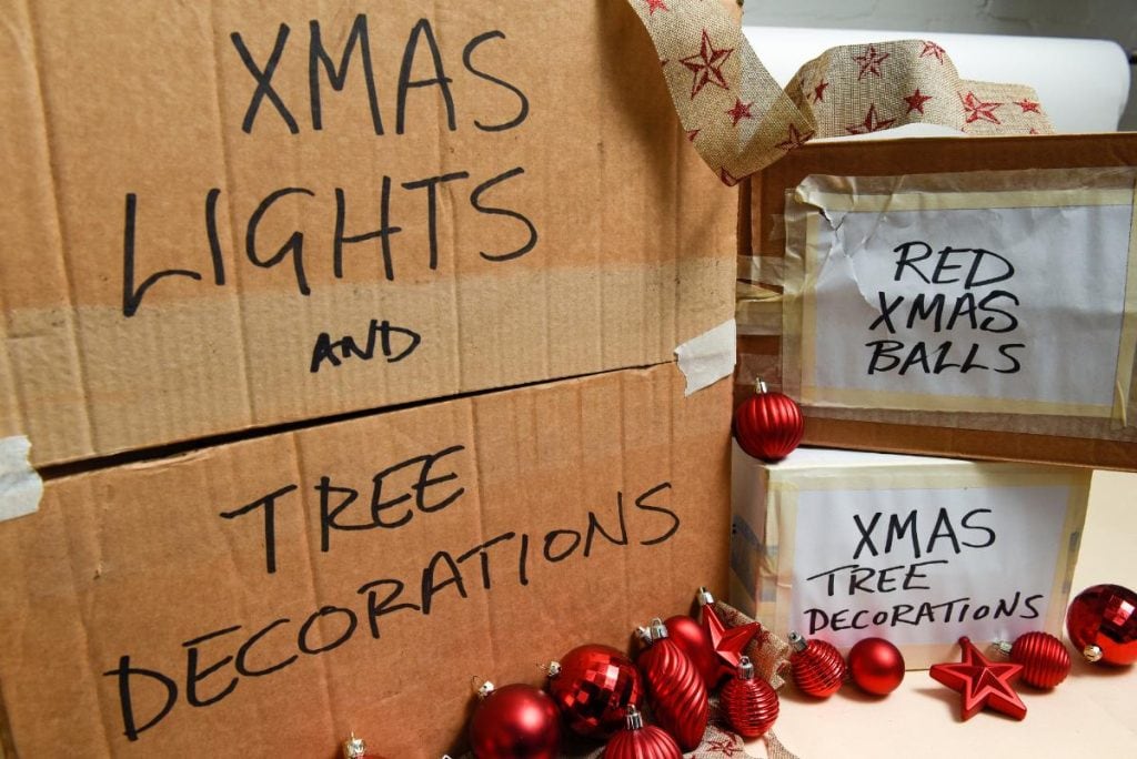 christmas decorations stored in cardboard boxes