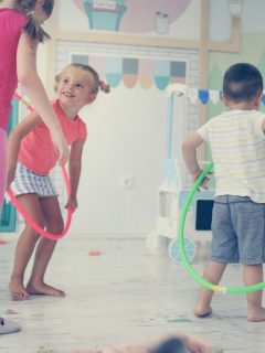 three kids playing indoors