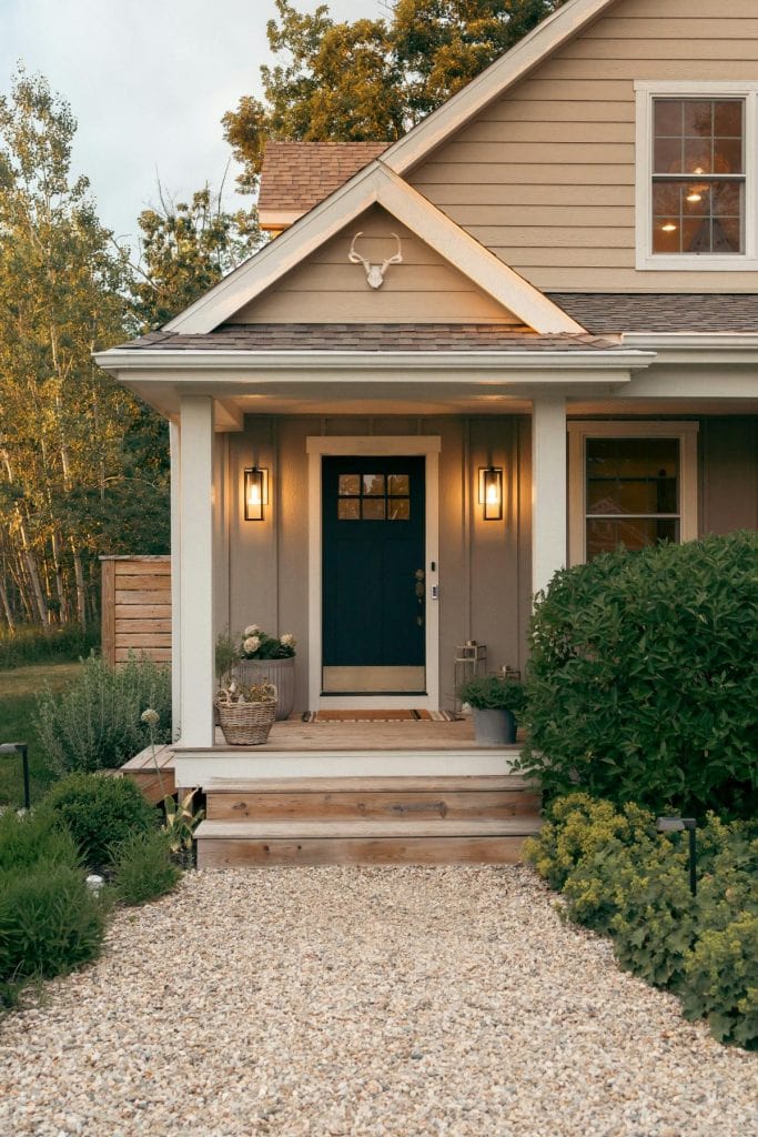 modern gray cabin with inviting porch